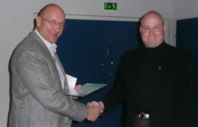 Klaus Bremer received FoMA's Certificate of Honor No. 4 from Chairman Tero Auranen.