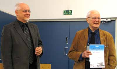 Kai R. Lehtonen (at right) received the Certificate of Honor from FoMA's Chairman Raine Haikarainen.